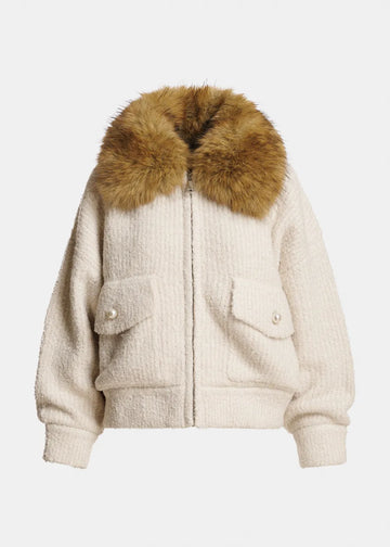 Beige jacket with a fur collar on a light gray background