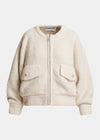An off-white bouclé zip-up jacket with two front flap pockets, photographed on a clean light gray background.