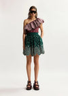model wearing green skirt