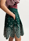 close up of green skirt 