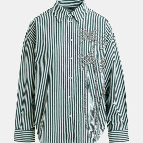 Green and white striped shirt with floral embroidery on a light gray background