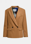 A camel brown double-breasted blazer with notched lapels and flap pockets, shown flat against a light gray background. The inner collar label shows the brand 'Essentiel Antwerp'.
