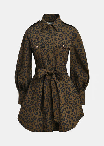 A leopard print shirt dress in brown and black, featuring a collar, button front, flap chest pockets, and a matching waist tie, shown against a light gray background.