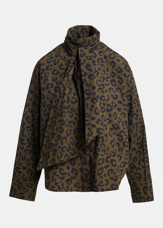 A leopard print wrap jacket with a high draped collar and tie-front detail, shown on a neutral light gray background.