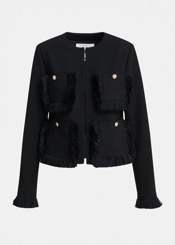 A black cropped jacket with fringed trim details and gold-tone button accents, shown against a plain light gray background.