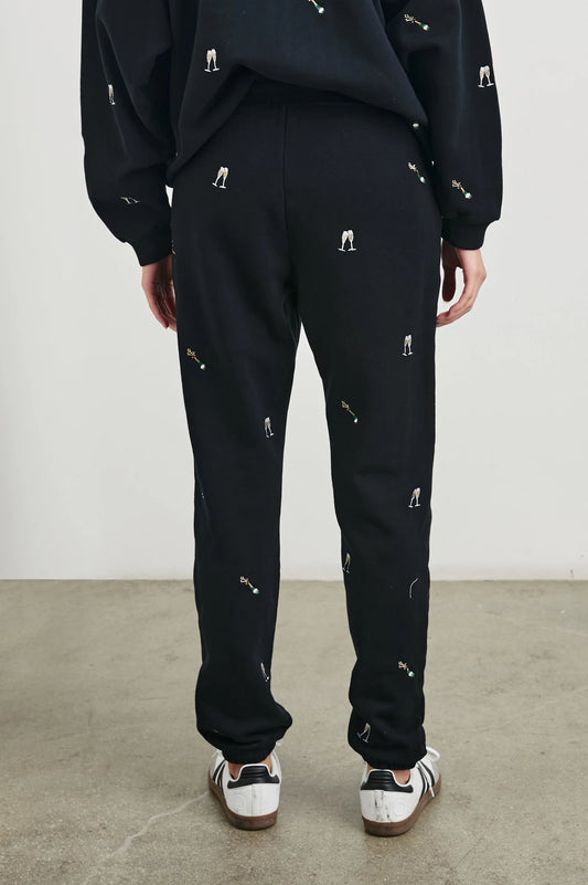 black sweat pants with champagne embroidery rear view 