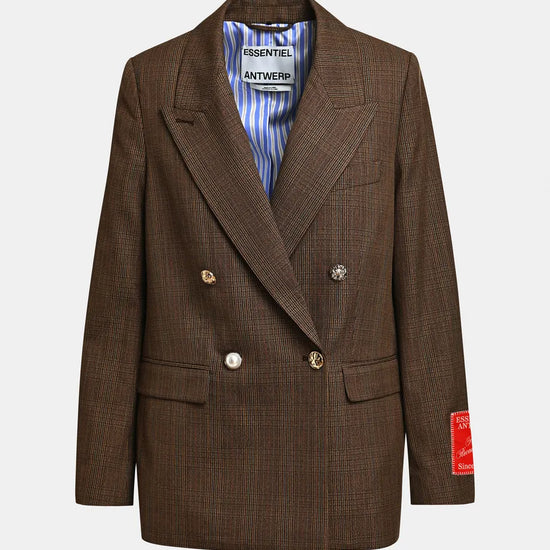 A brown double-breasted blazer with a subtle plaid pattern, featuring gold-tone buttons, a striped blue and white shirt underneath, and a red patch on the sleeve, shown against a light gray background.