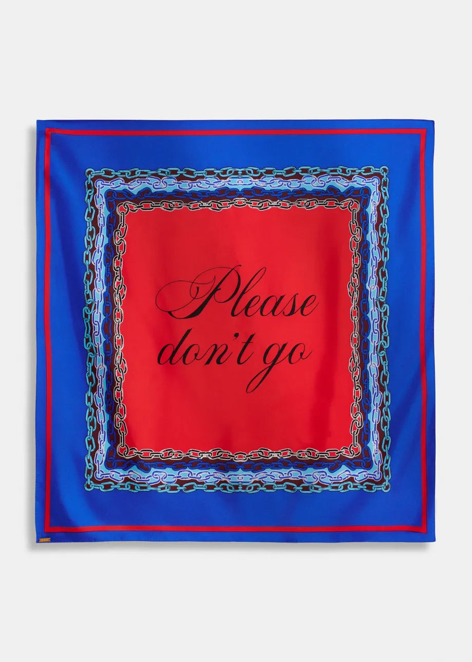 A square silk scarf featuring a vibrant red center with the phrase 'Please don't go' in black cursive, surrounded by a blue border with red and gold chain-link patterns, set against a light gray background.