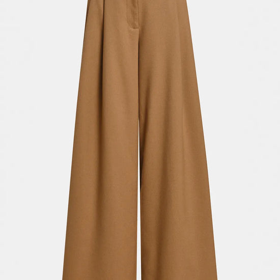 A pair of wide-leg trousers in a warm camel brown color, shown flat against a light gray background.