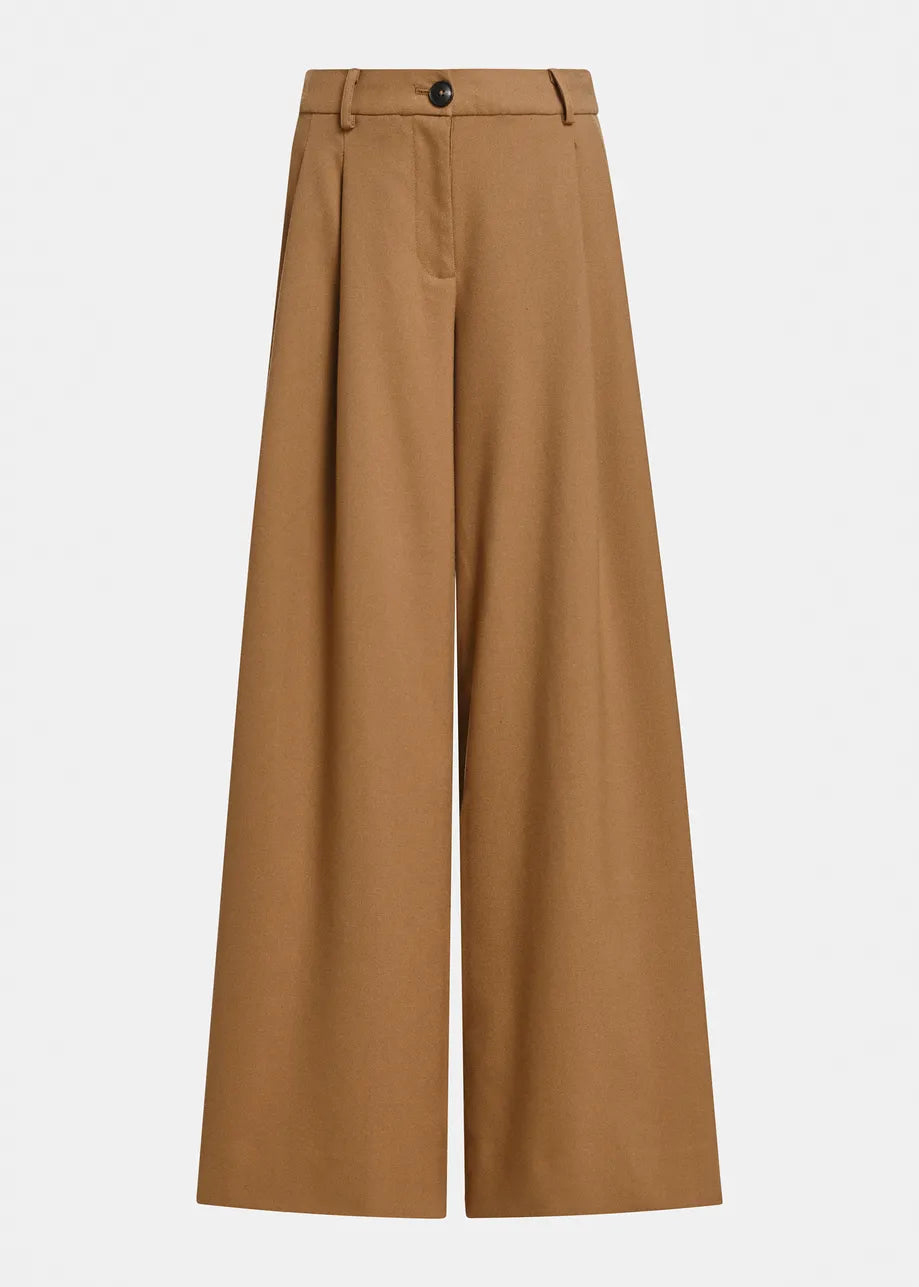 A pair of wide-leg trousers in a warm camel brown color, shown flat against a light gray background.