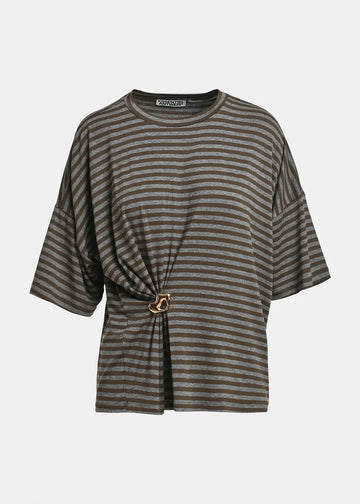 A striped short-sleeve top with a gathered front detail and a gold-tone ring accent, shown against a plain light gray background.