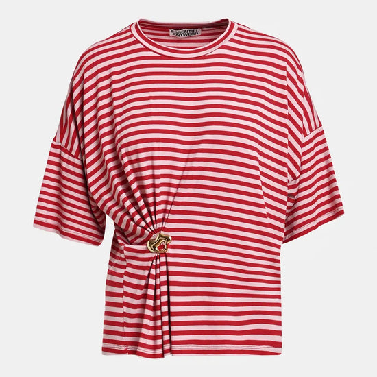 A red and white horizontally striped short-sleeve top with a gathered waist detail and a decorative gold-toned ring accent, shown against a light gray background.