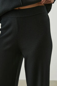 Black straight leg jersey stretch knitted trousers