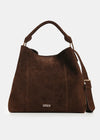 A dark brown suede hobo handbag with a top handle and an adjustable shoulder strap, featuring a small gold-tone brand logo on the front.