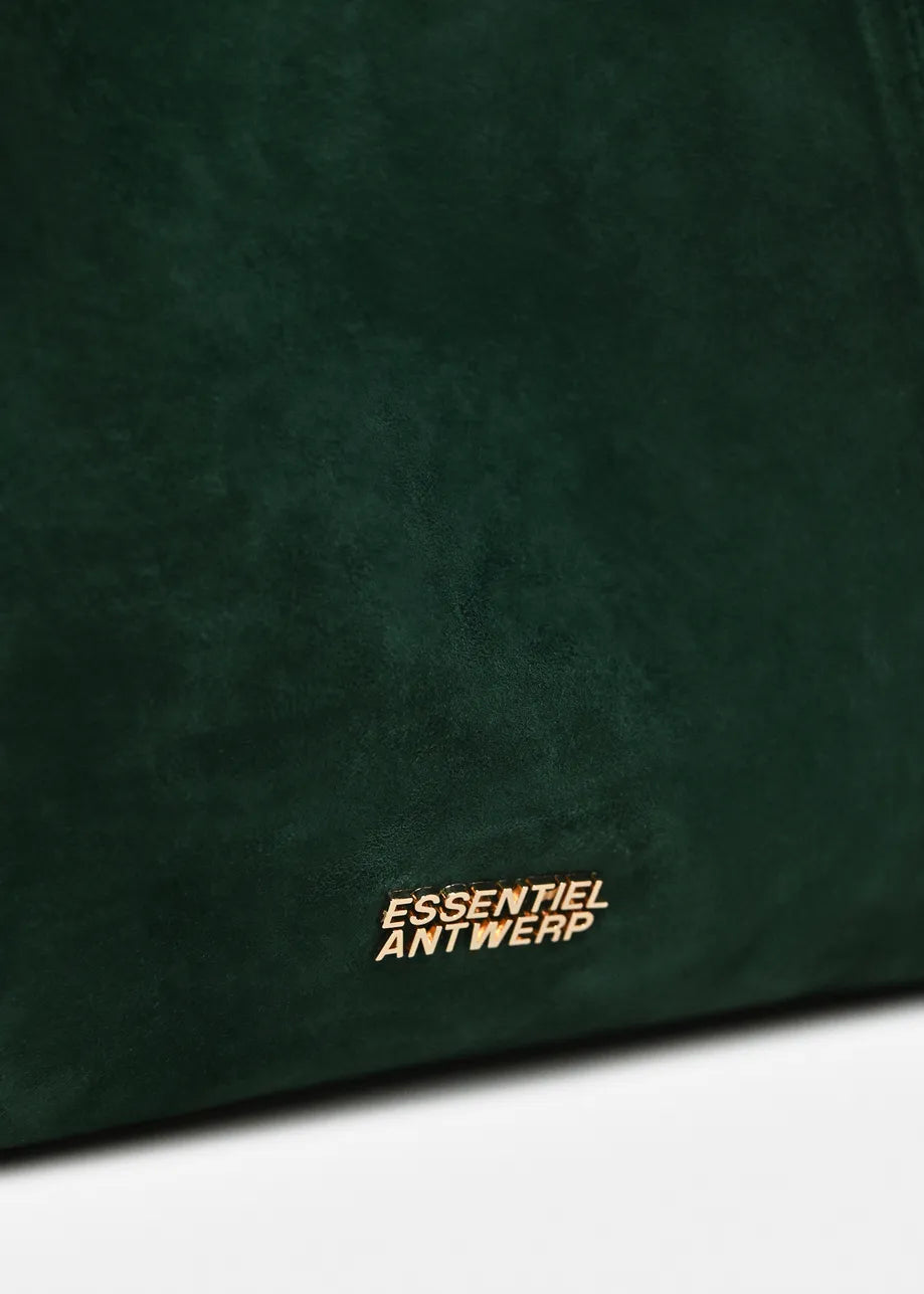 Close-up of a dark green suede or velvet bag surface with the gold-toned 'ESSENTIEL ANTWERP' logo near the bottom.