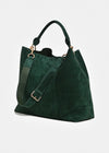 A dark green suede tote bag with a matching shoulder strap, gold-tone hardware, and top handles, shown on a light gray background.