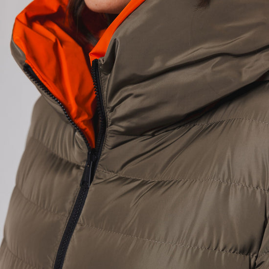 khaki long padded reversible coat with hood and orange interior close up