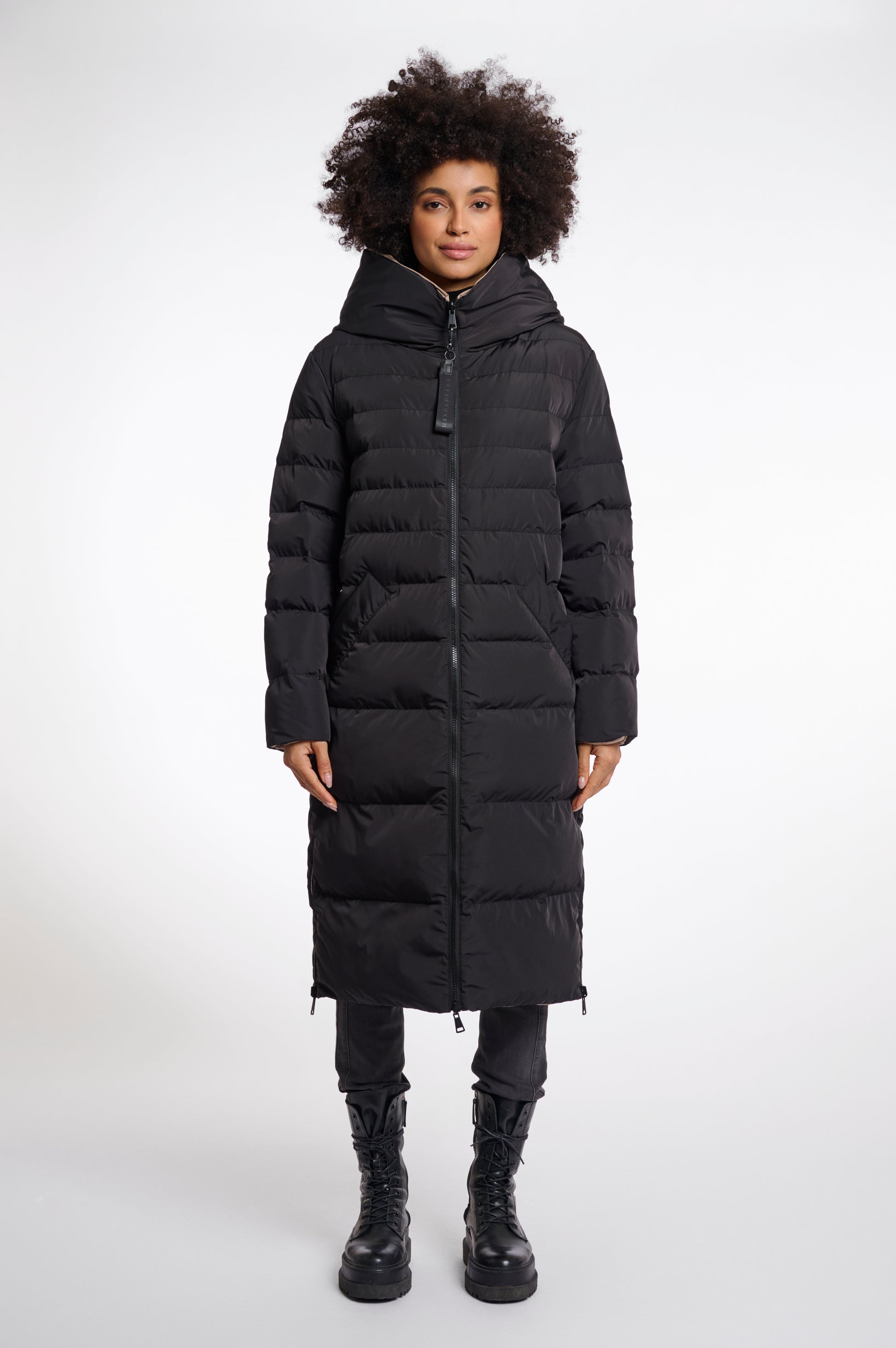 reversible black mid length padded coat with a brown interior, high neck and collar