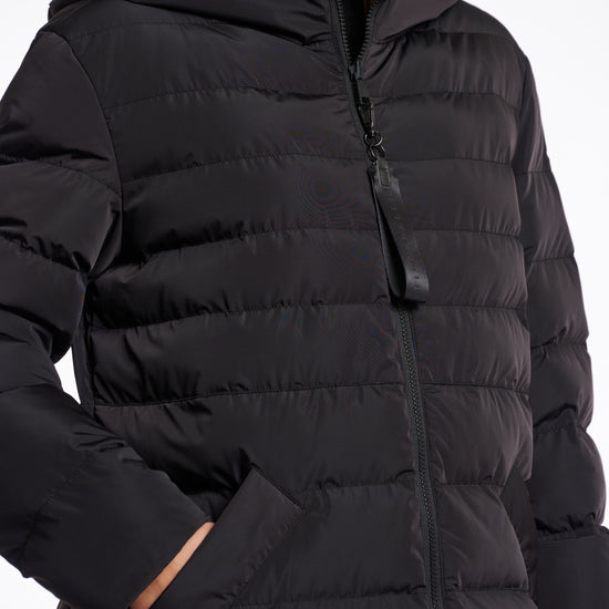 reversible black mid length padded coat with a brown interior, high neck and collar close up