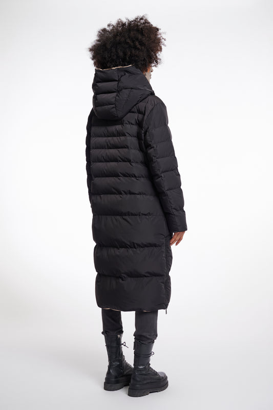 reversible black mid length padded coat with a brown interior, high neck and collar rear view 