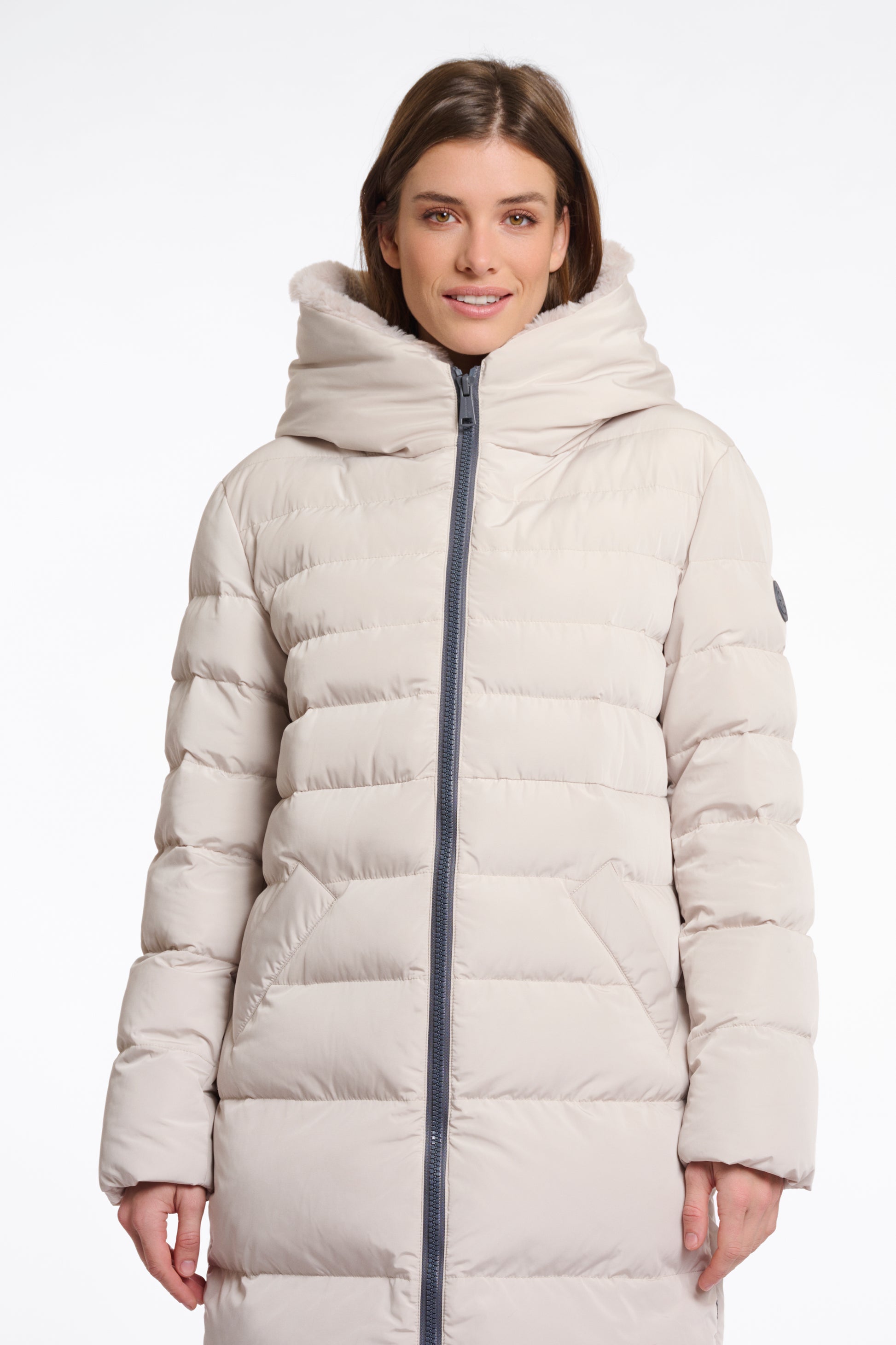 mid length beige padded coat with faux fur inside and hood close up