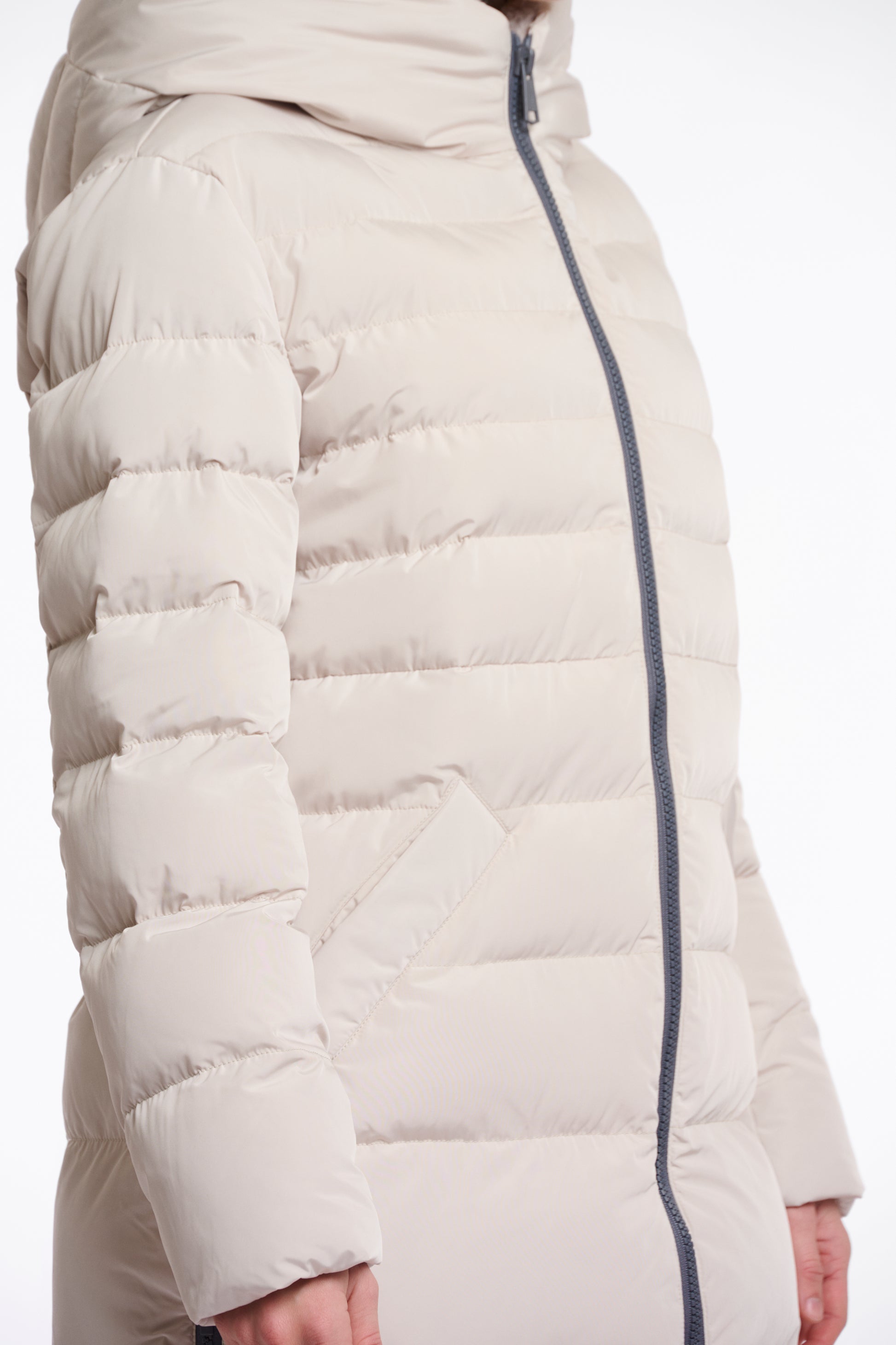 mid length beige padded coat with faux fur inside and hood side view