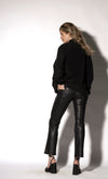 black faux leather flared ankle high waist jeans rear view