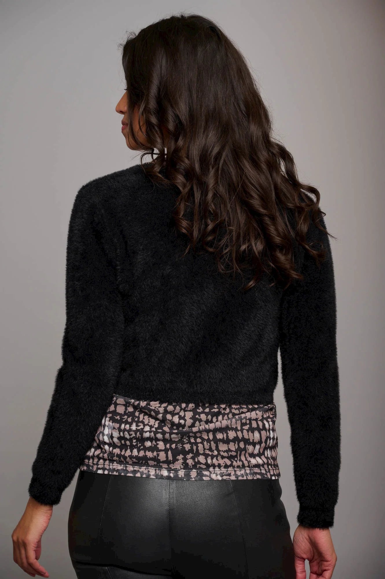 Cropped black long sleeved cardigan with tie fastening