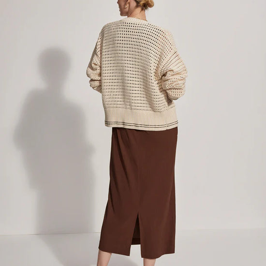 Button through pointelle knit cardigan in ecru with green details rear view