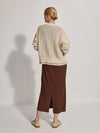 Button through pointelle knit cardigan in ecru with green details rear view