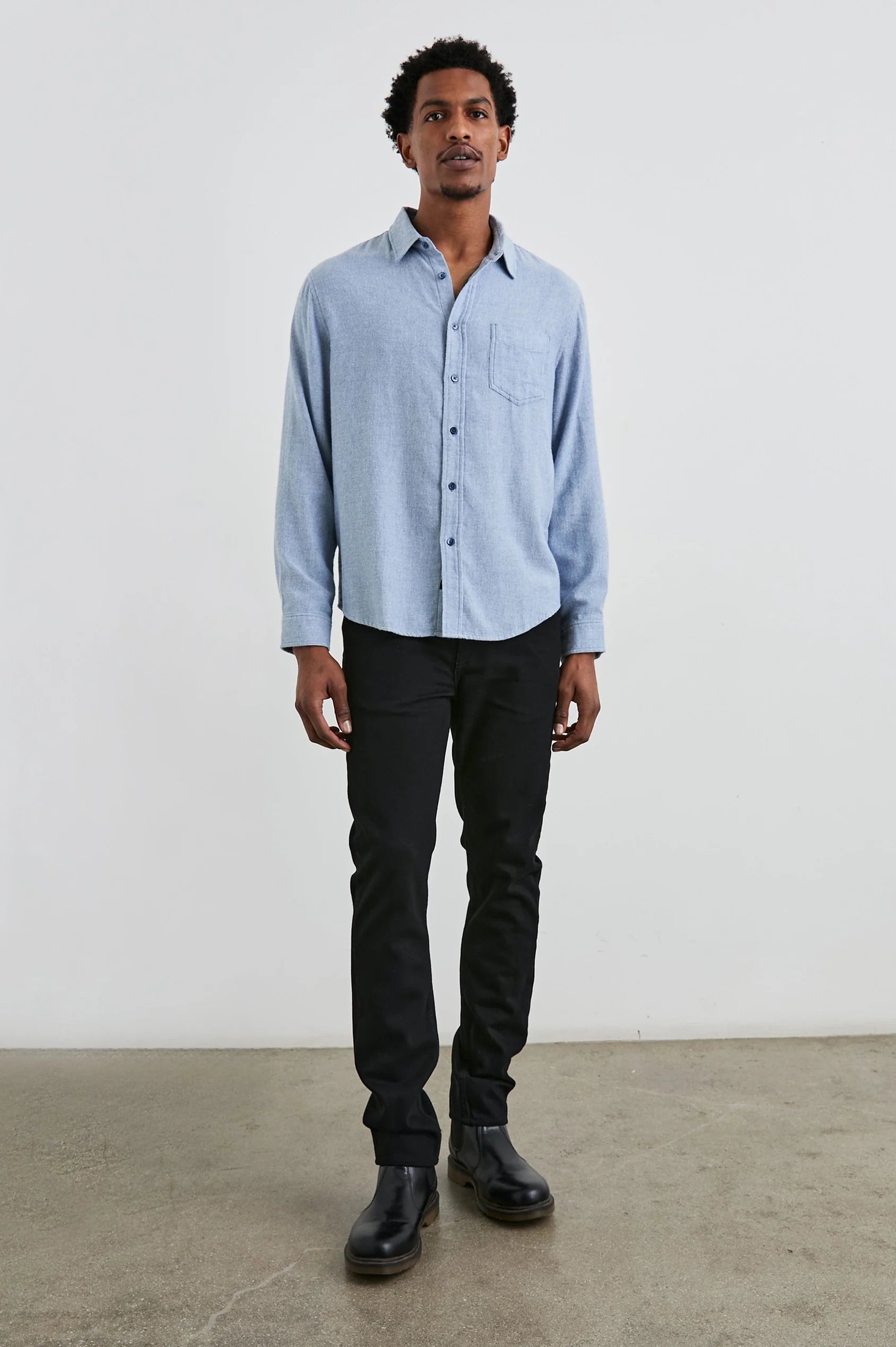 mens blue shirt with chest pocket and curved hem