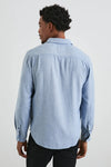 mens blue shirt with chest pocket and curved hem rear view 