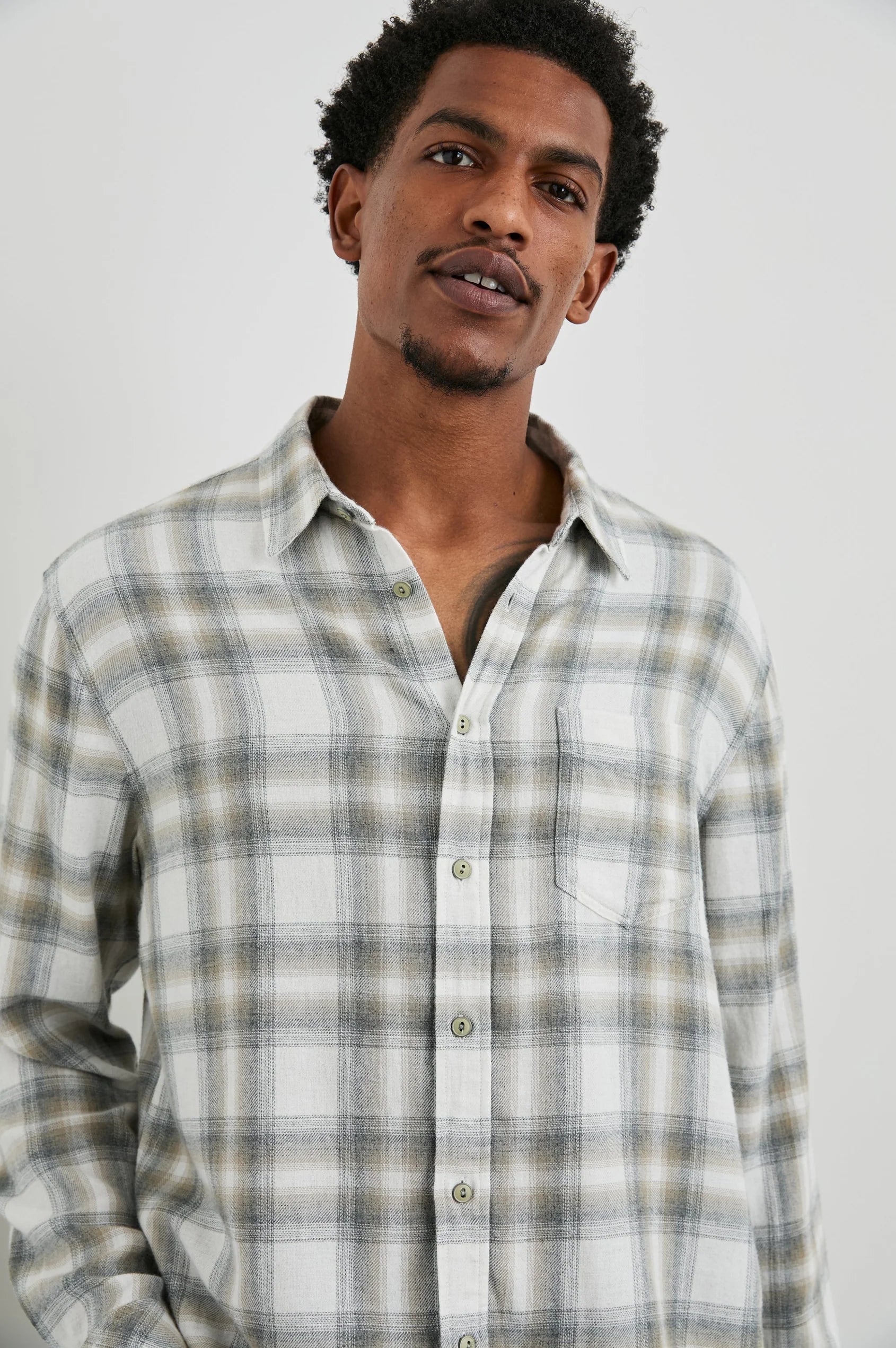 Neutral check shirt with chest pocket close up