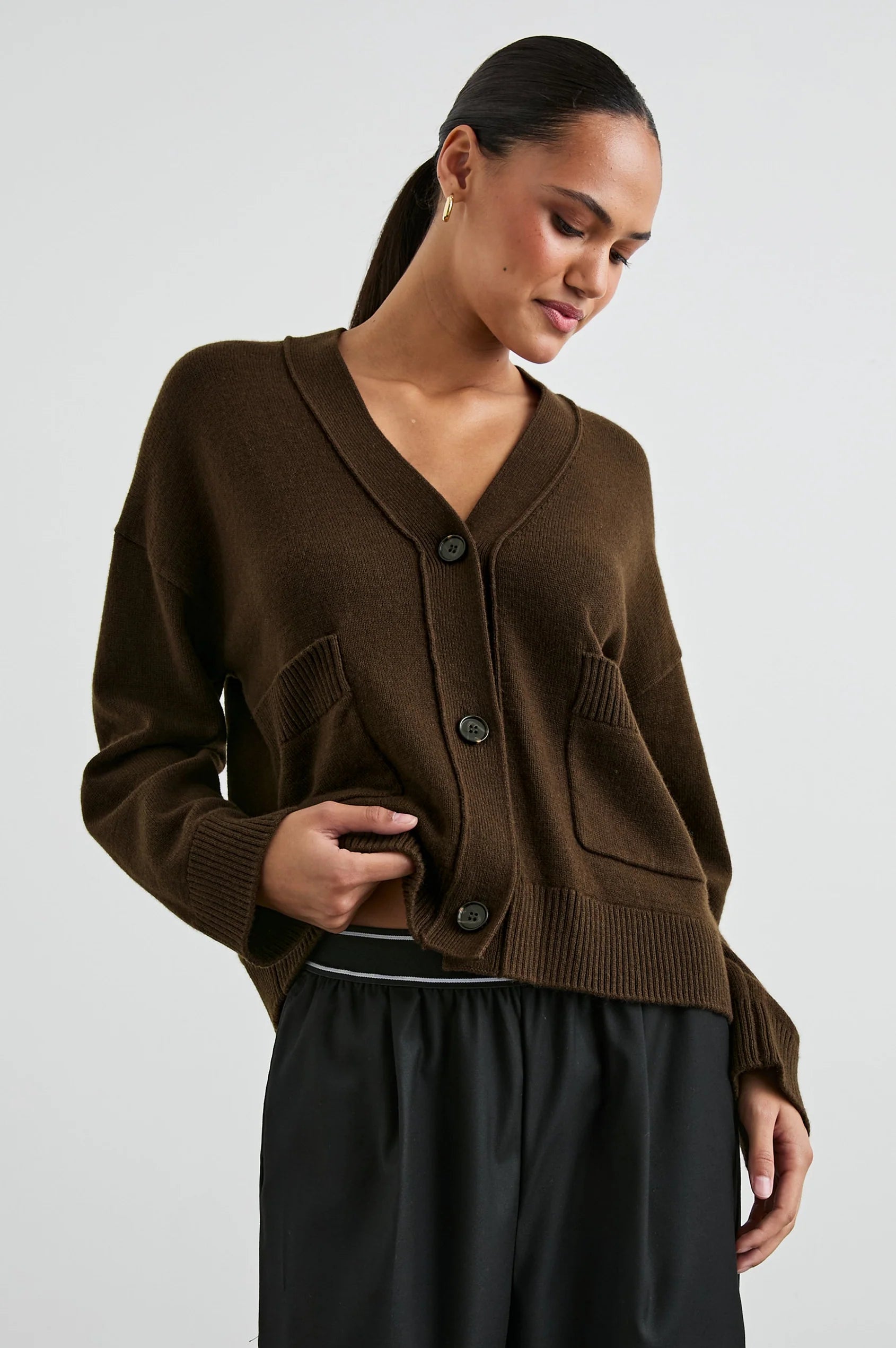 dark brown v neck cardigan with 2 front patch pockets model shot