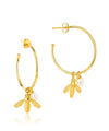 Large gold hoop earrings with flying bee pendants and a rice pearl drop with butterfly earring fastenings