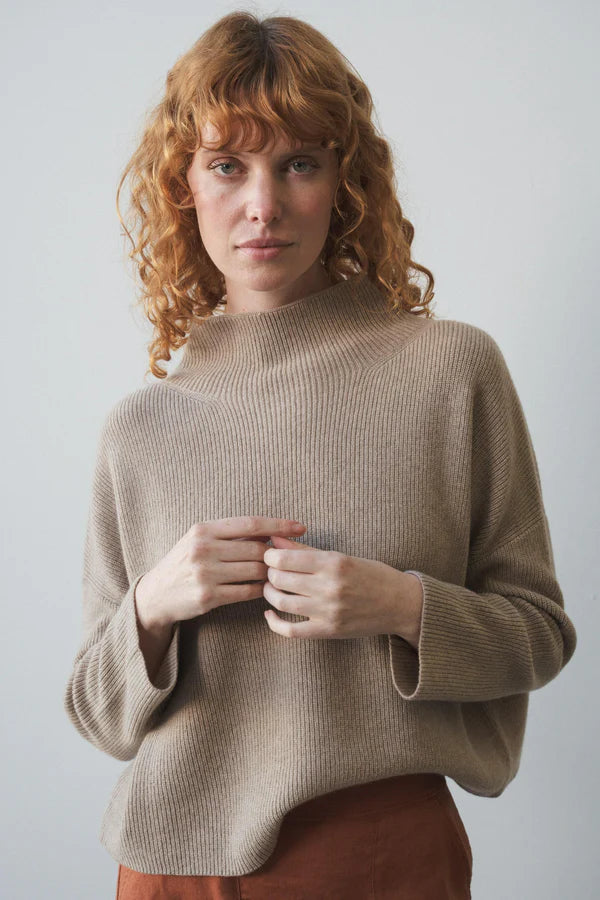 taupe ribbed jumper with stand neck and long sleeves