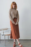 taupe ribbed jumper with stand neck and long sleeves model shot