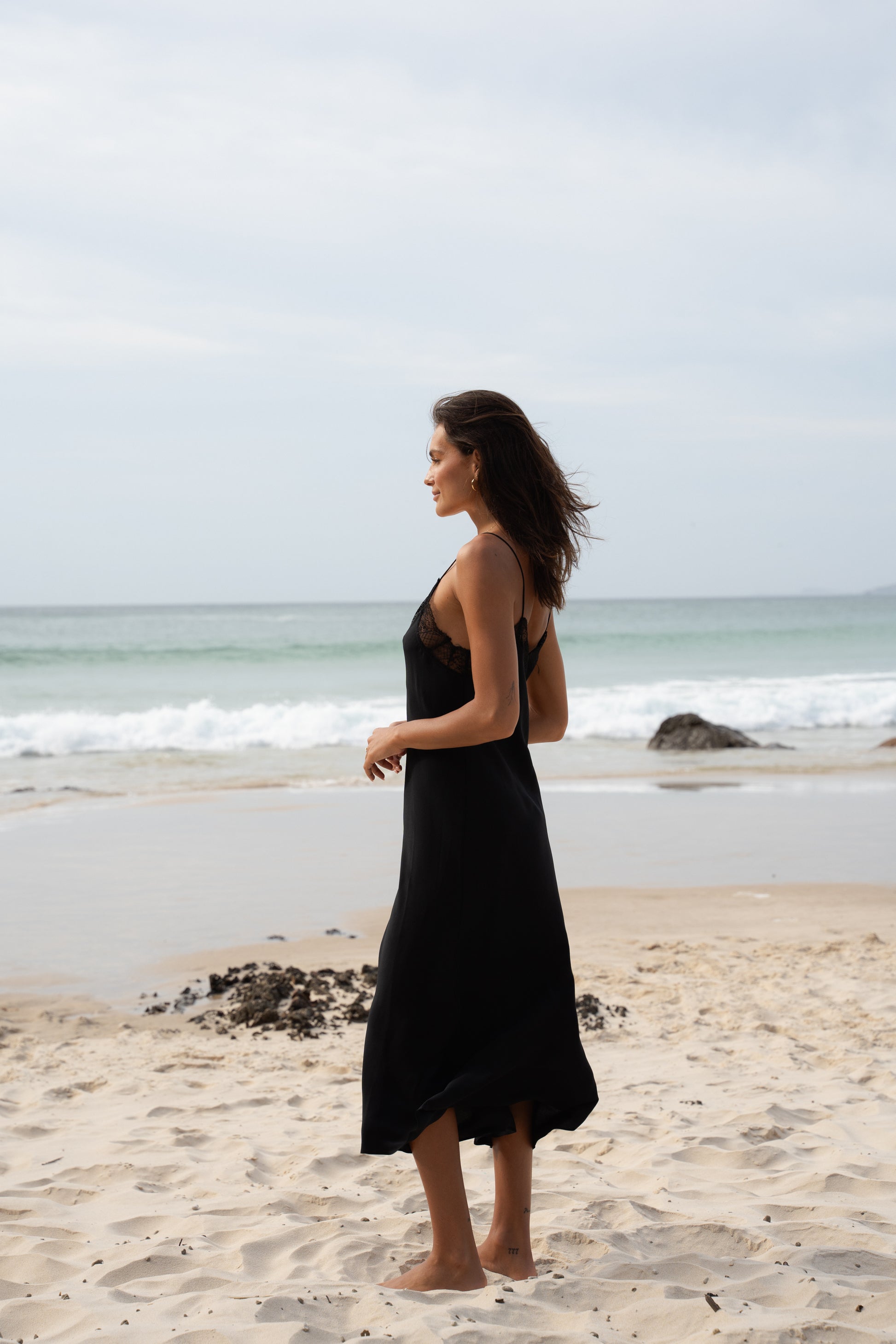 Side view of lack lace silk dress