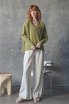 v neck olive cashmere jumper with rib detailing model shot