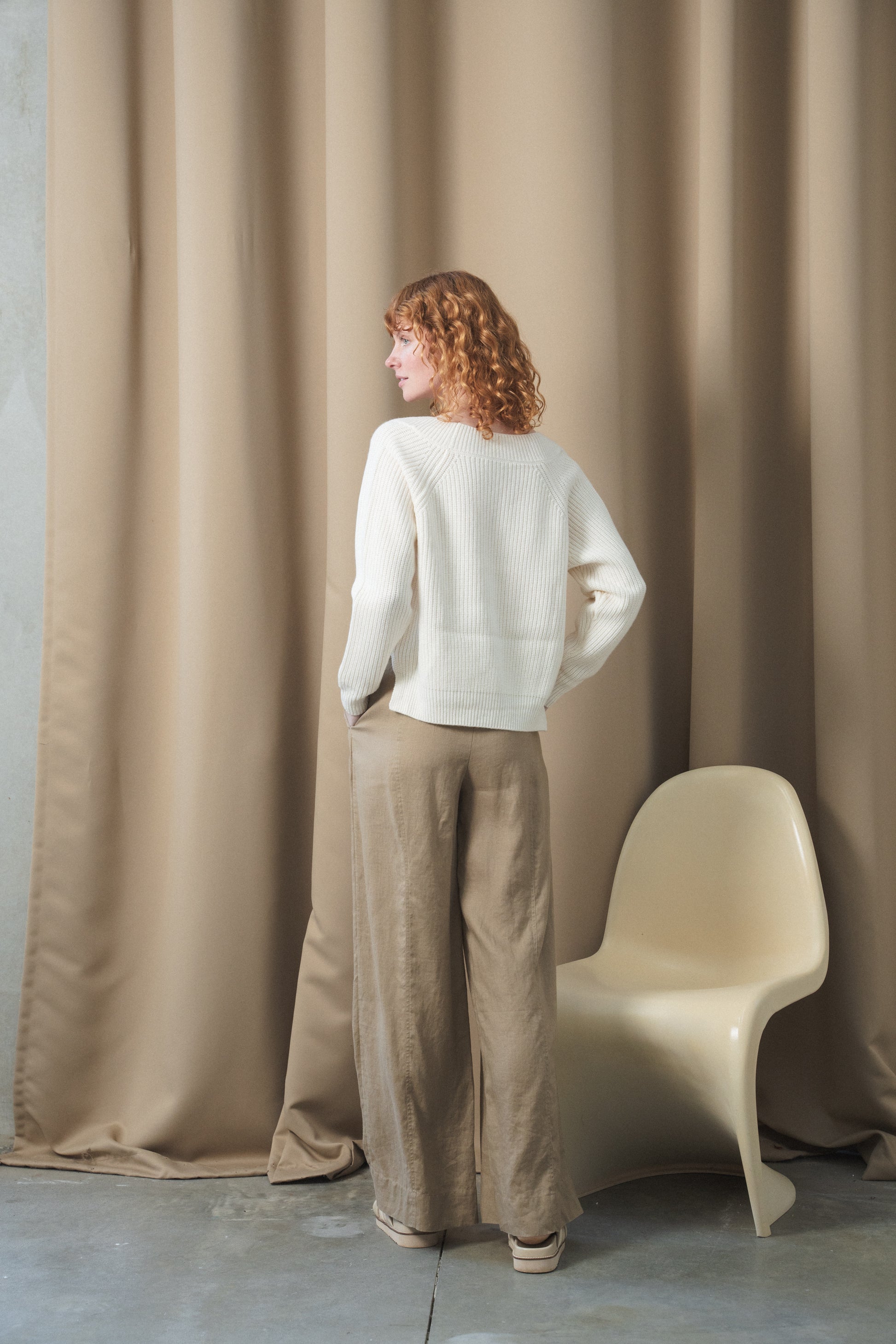 Rear view of cream rib knit