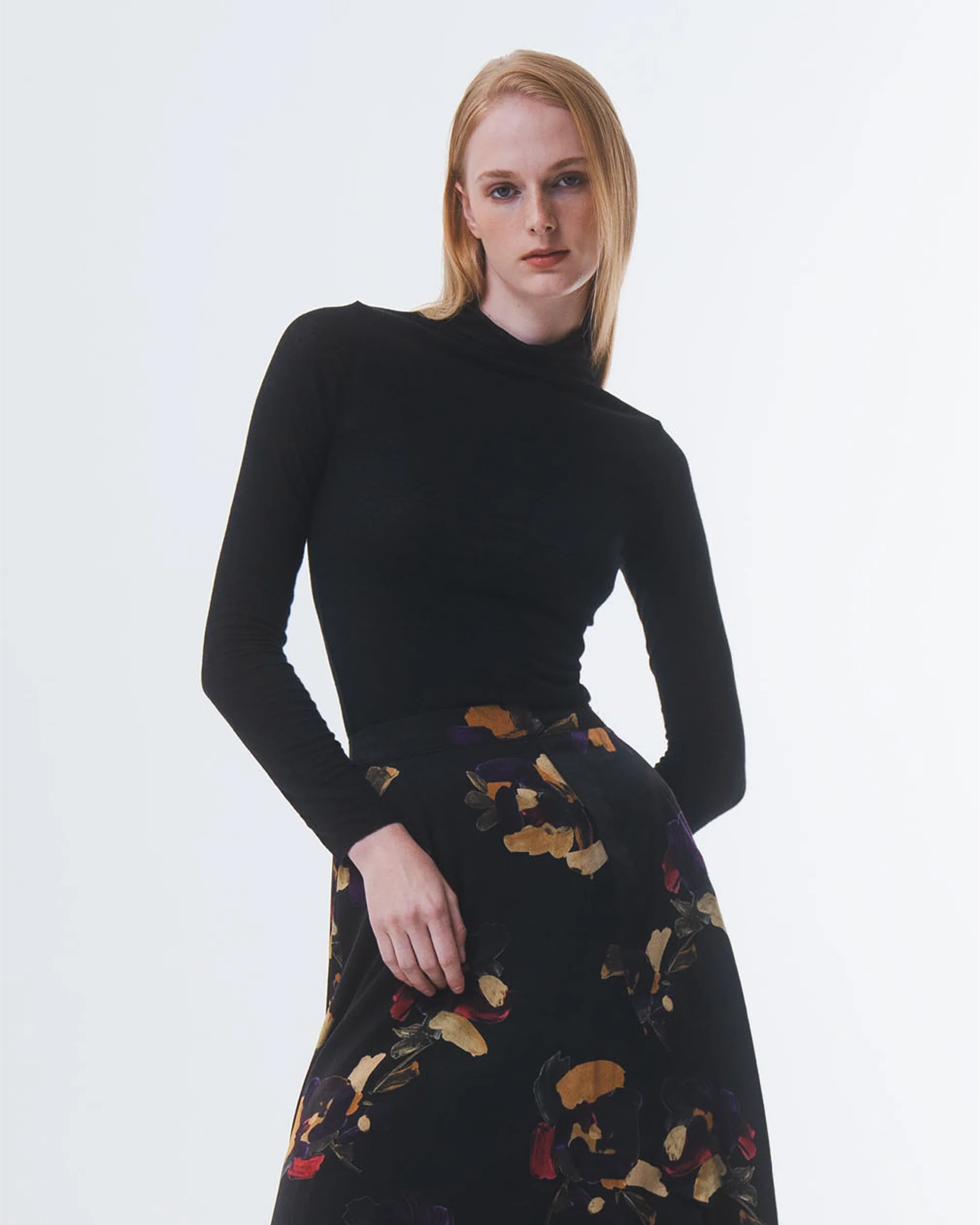 super soft long sleeve black top with high round neck close up