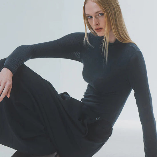 super soft long sleeve off navy top with high round neck model shot 