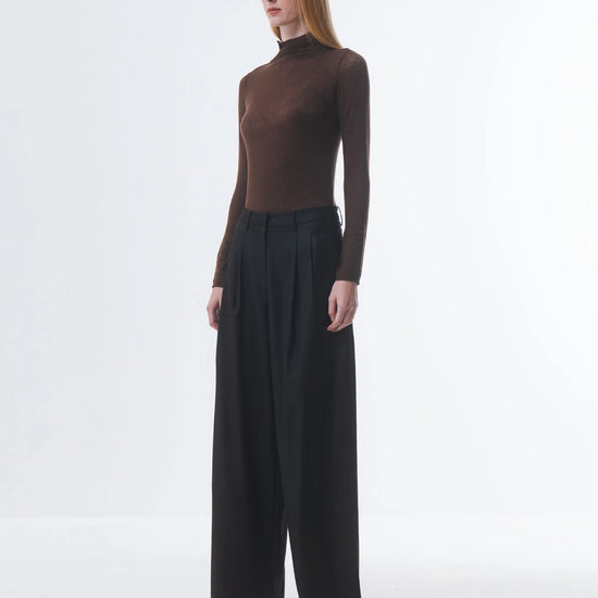 super soft long sleeve off navy top with high round neck side view 