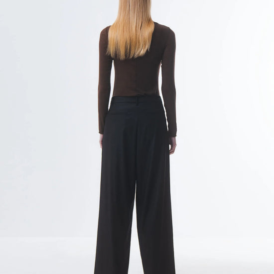 super soft long sleeve off navy top with high round neck rear view 