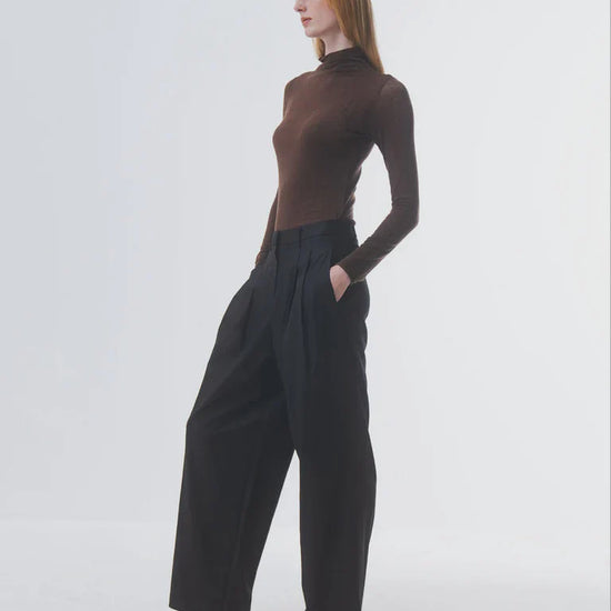 super soft long sleeve off navy top with high round neck side view