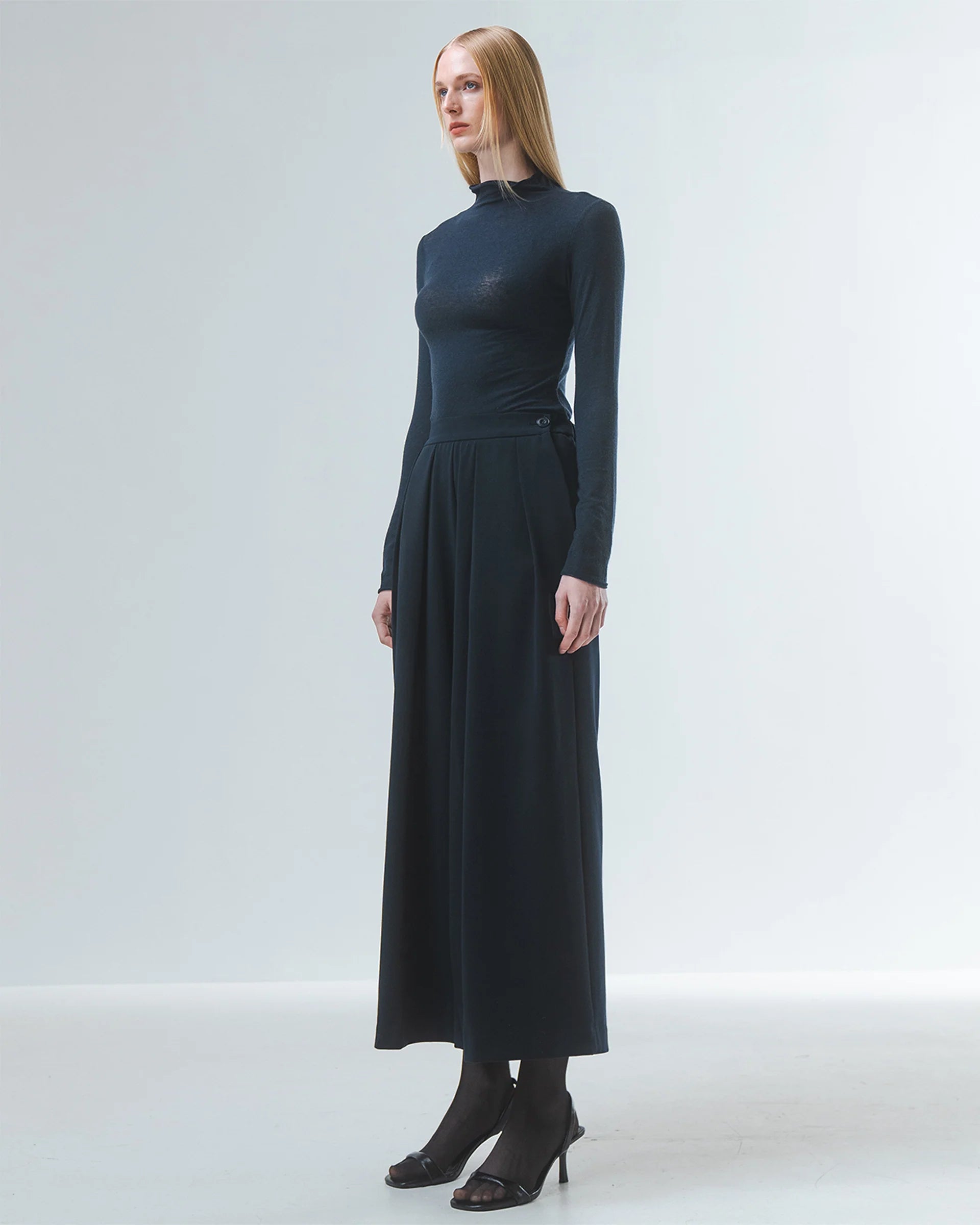 super soft long sleeve off navy top with high round neck side view 