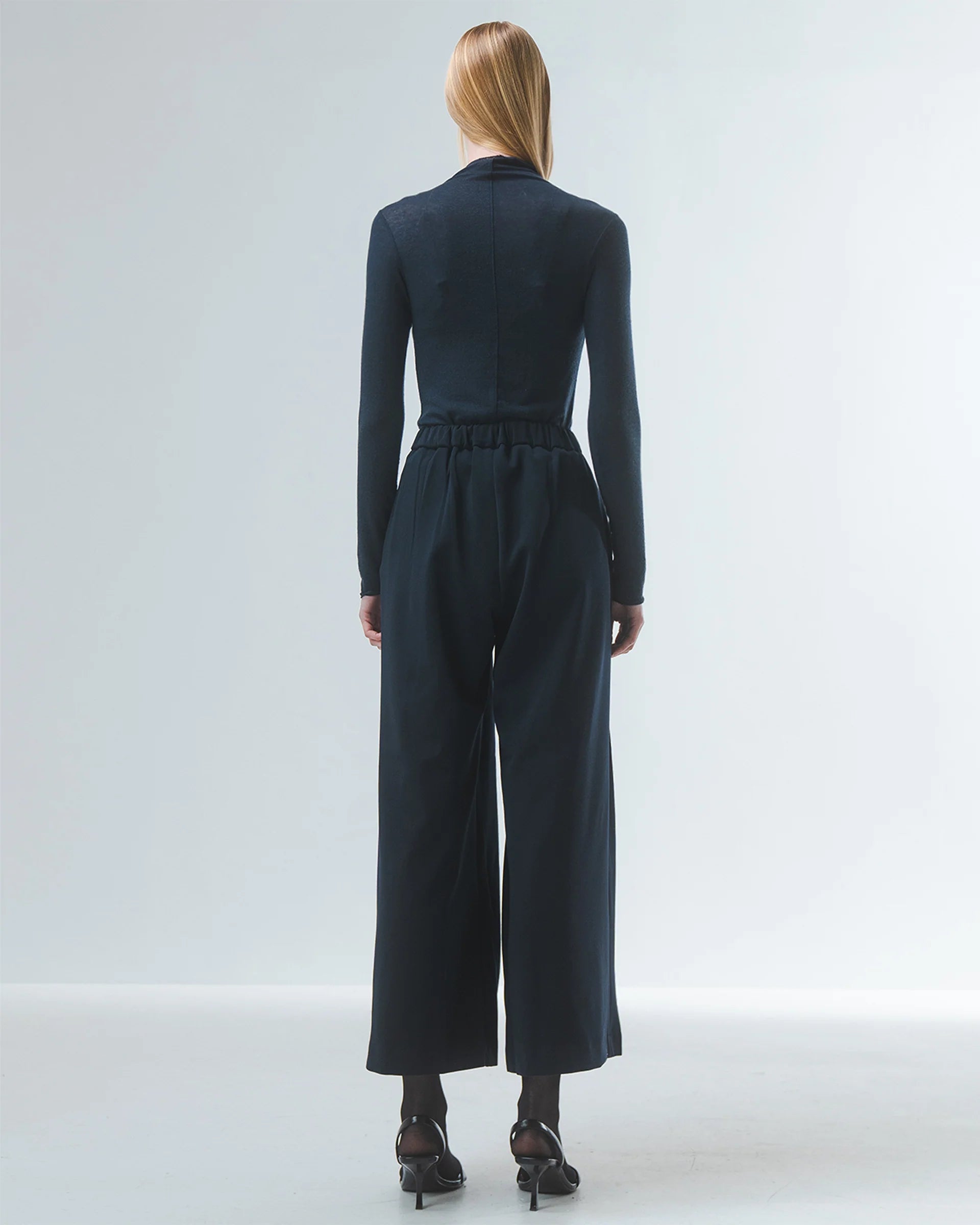 super soft long sleeve off navy top with high round neck rear view 