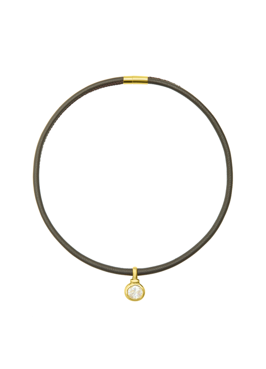 Thin black leather choker with a gold clasp and pendant on a white background
