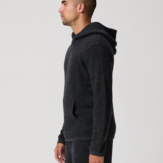 dark grey knitted hoodie with big pocket from paige side view