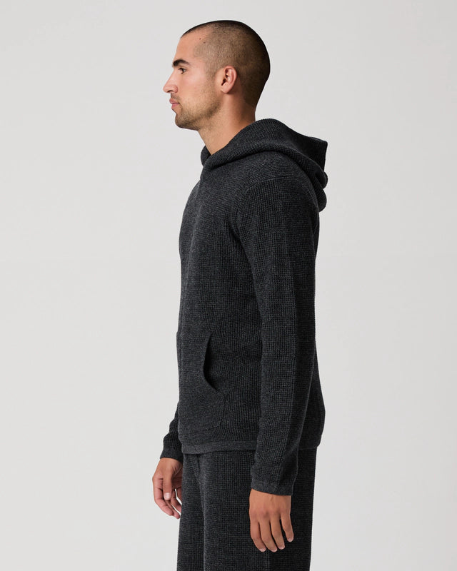 dark grey knitted hoodie with big pocket from paige side view